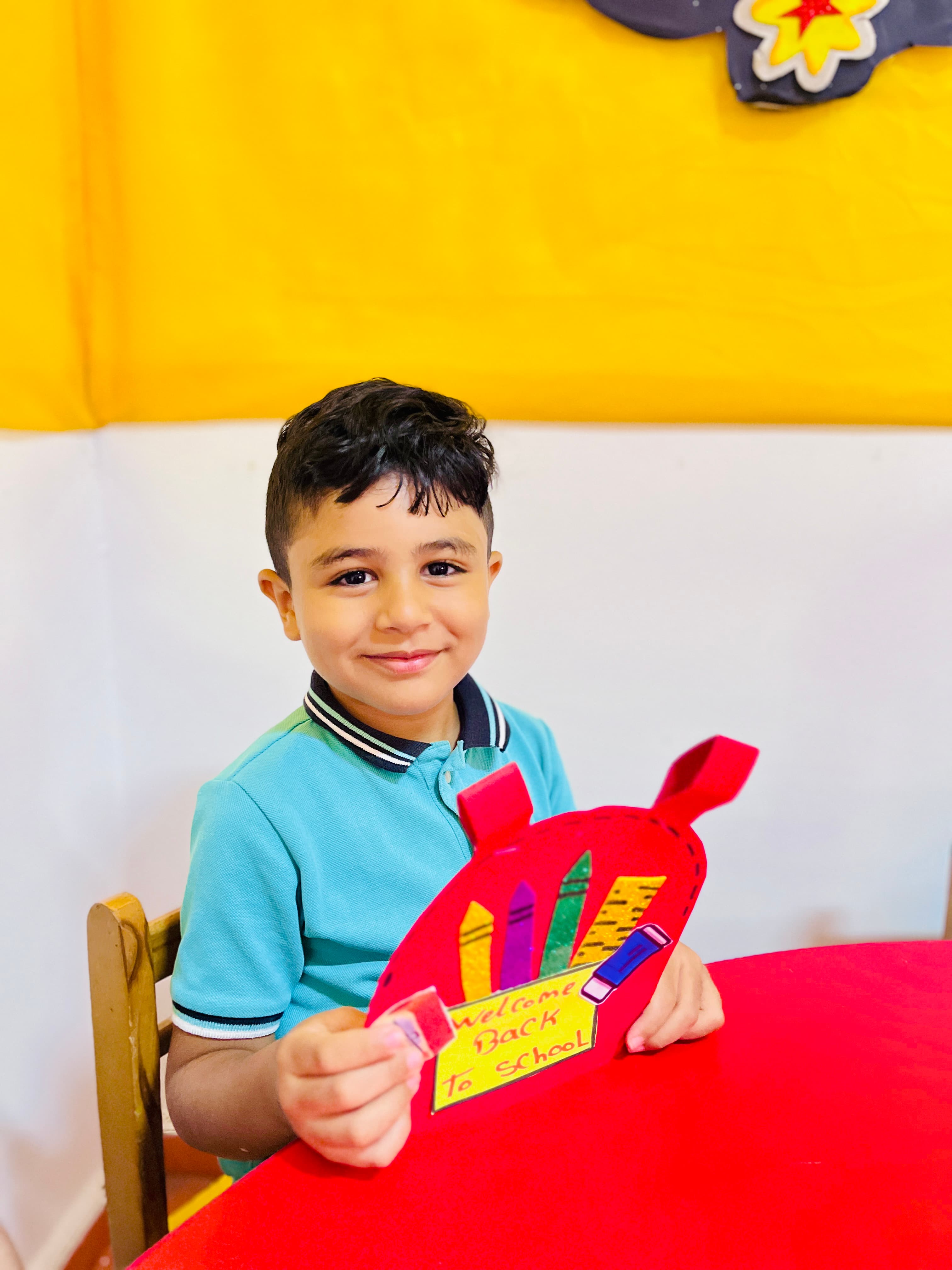 A young MEIS student with his work