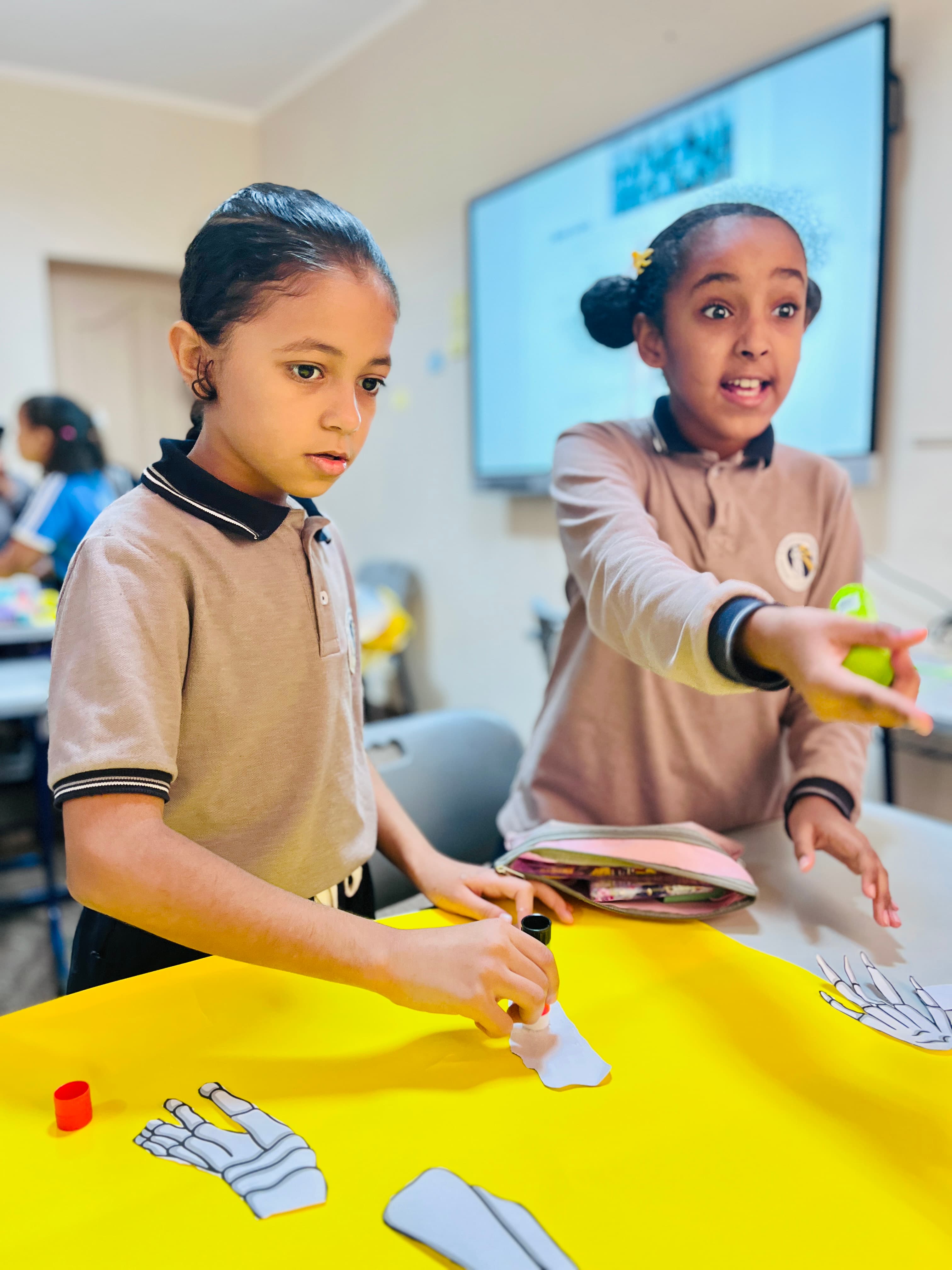 Two MEIS students working together