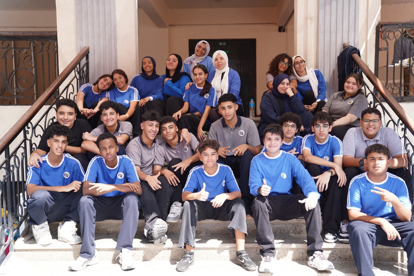MEIS students together on the school steps