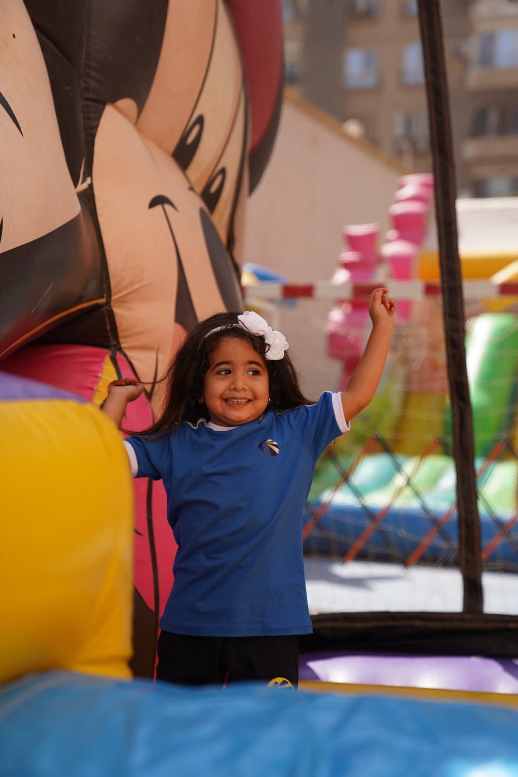 A student cheering at a fun day
