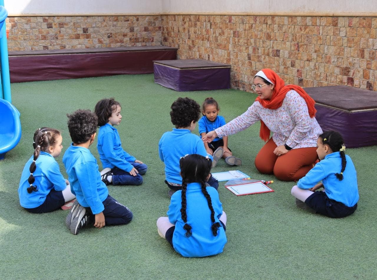 Young students in an outdoor learning circle