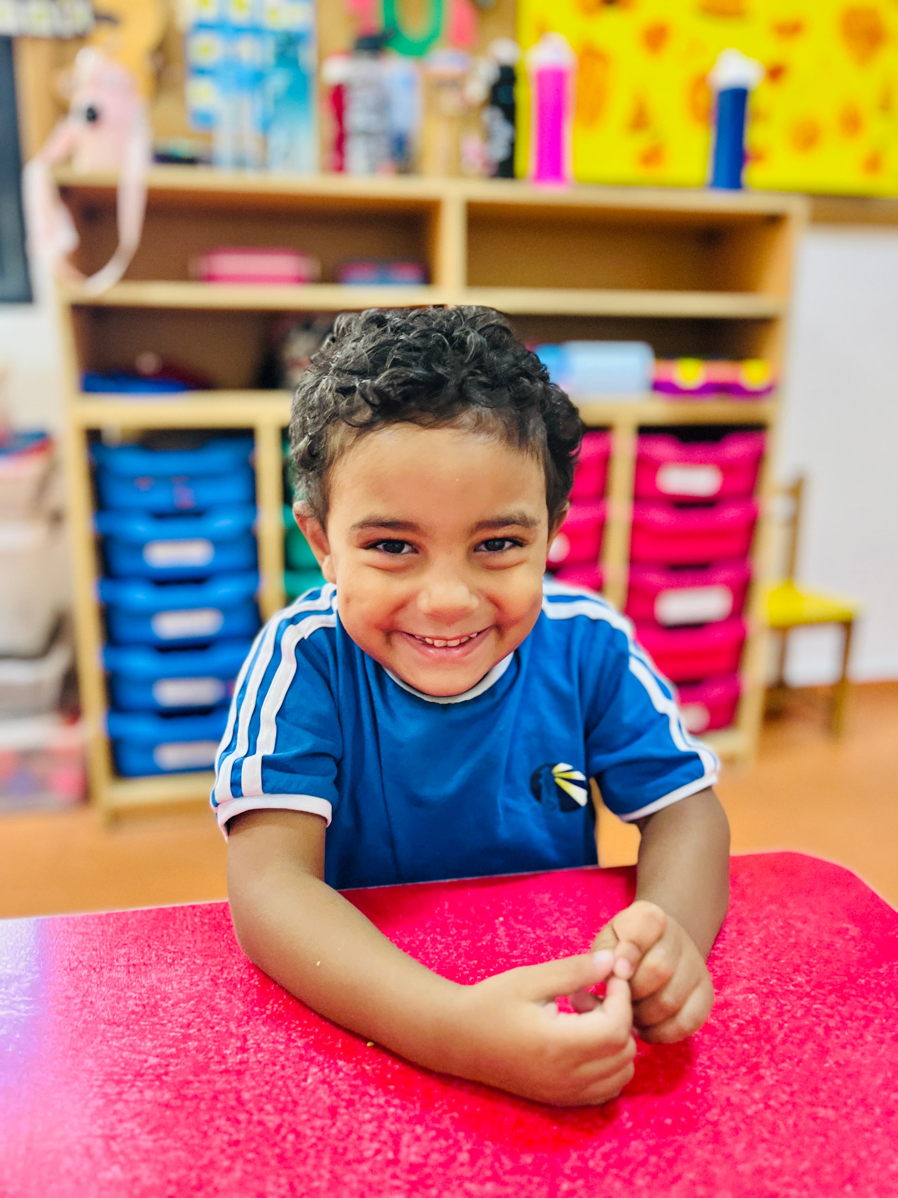 A smiling young MEIS student